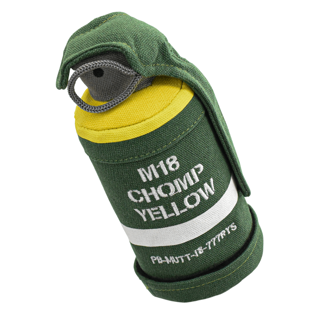 carbon hound Mutt-18 M18 smoke grenade dog toys with treat cavity open showing dog treats in heavy canvas for aggressive chewers close up