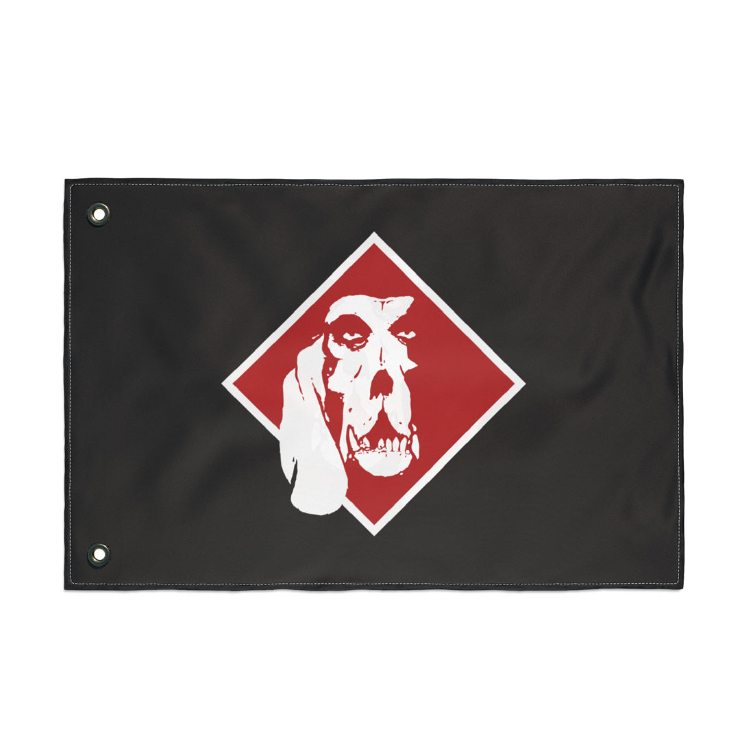 A black rectangular morale flag with two metal grommets on the left side with Carbon Hound's red dog logo in the center, the front side of the flag