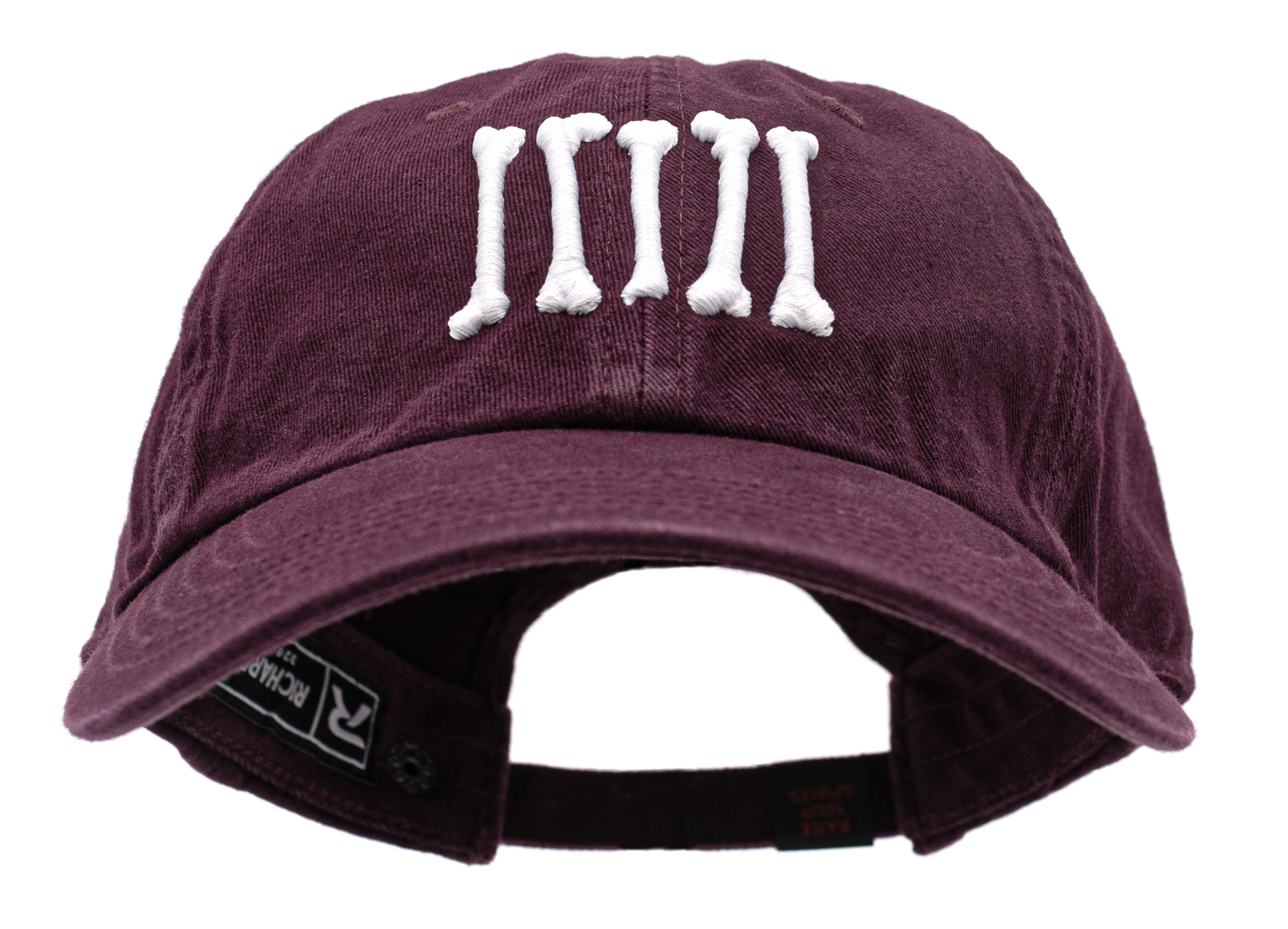 carbon hound maroon baseball dad hat with white embroidered rebel bones logo on the front