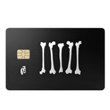 an image of carbon hound's gift card referred to as BONES, shown as a black credit card style card with carbon hounds rebel bones logo on it, with the gold chip on it